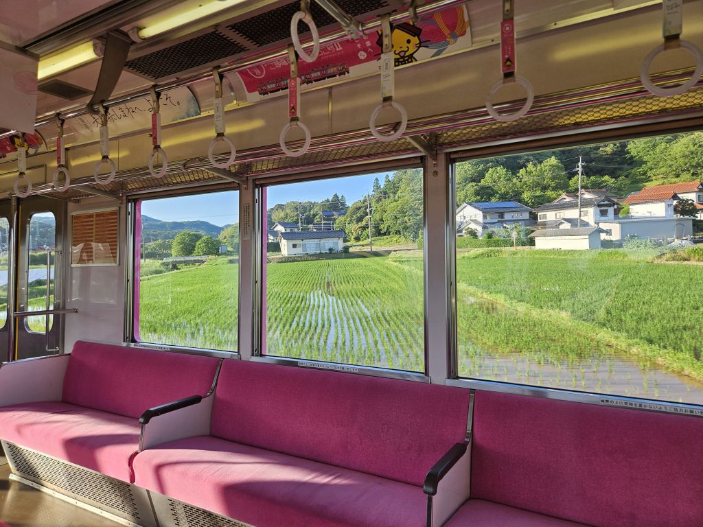 ばたでん車窓一畑口駅前のカーブの右側の田園